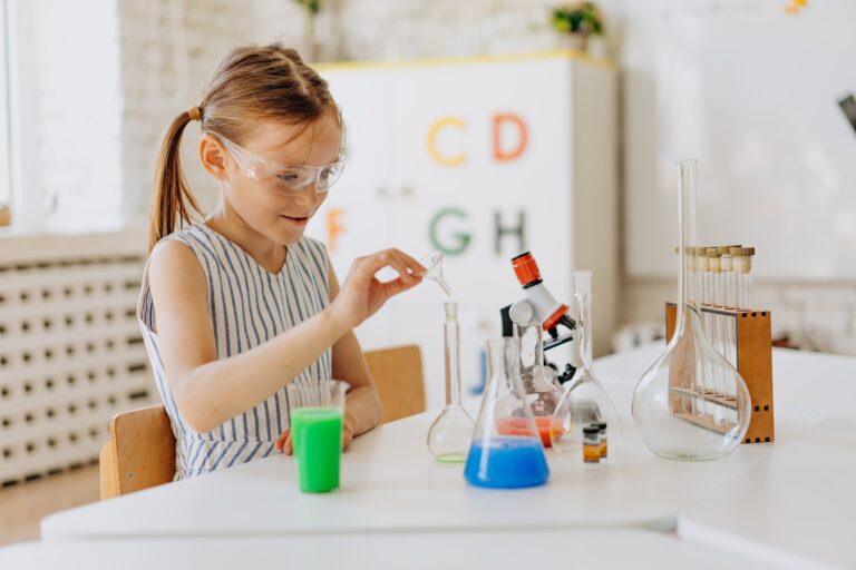 A Girl Doing a Science Experiment