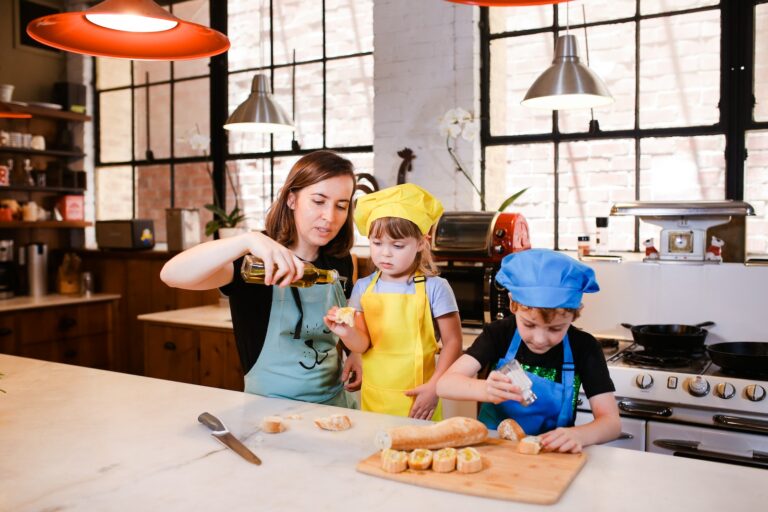 Woman in Yellow Shirt Holding Girl in Yellow Shirt